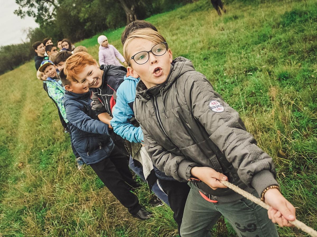 A group of young people working together in a team activity